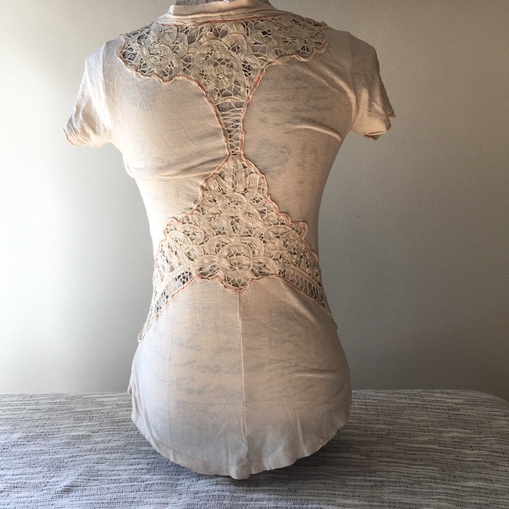 Free People lace cutout T-shirt.